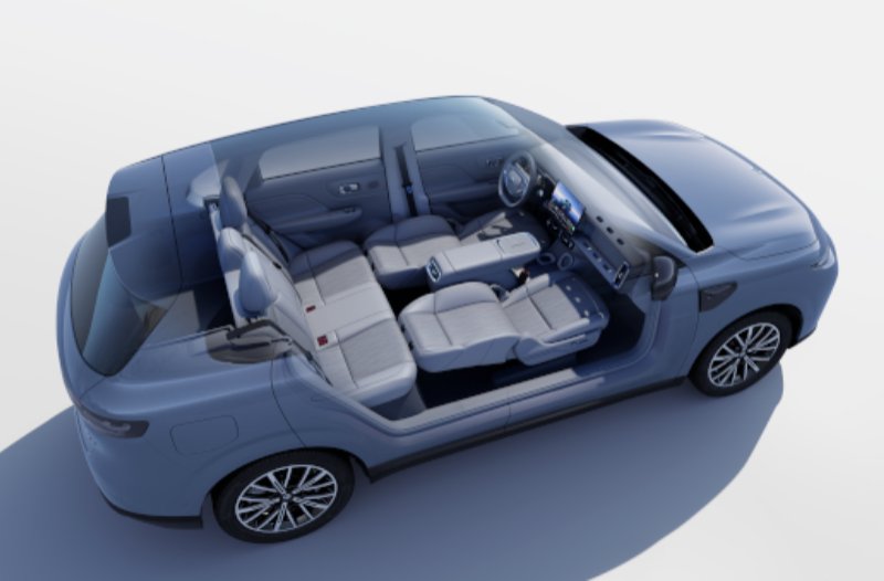 Overhead view of a blue car with doors removed, showing interior seating and dashboard.