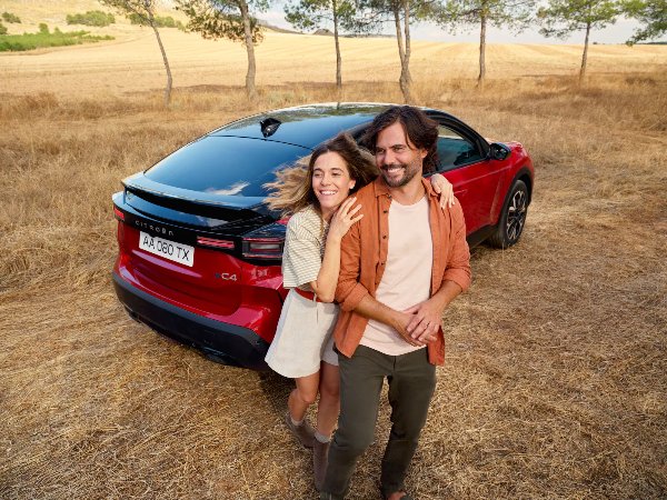 citroen c4 in red with man and woman