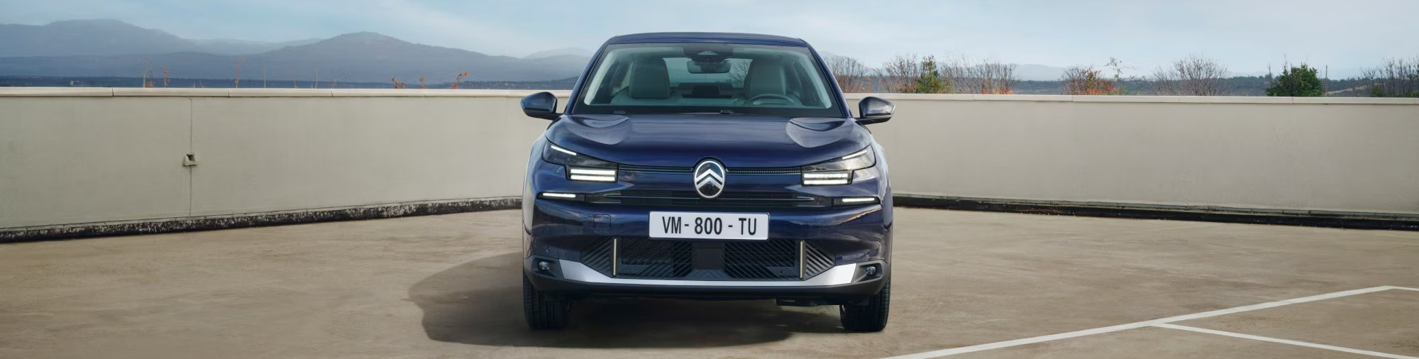 citroen c4 x from the front in blue