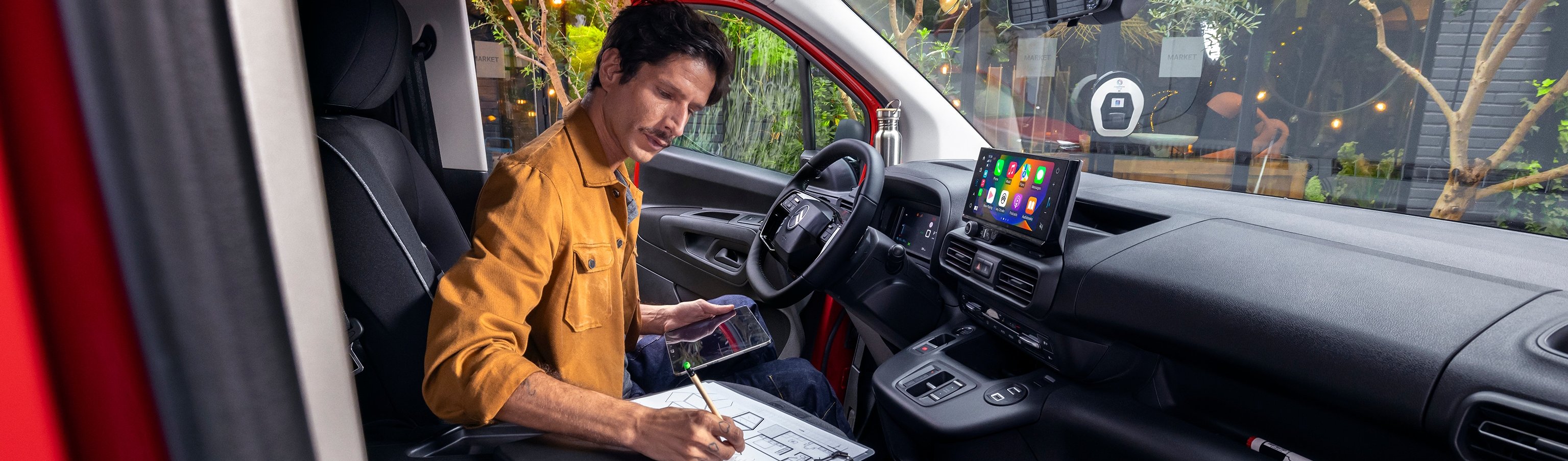 citroen e berlingo with man in van