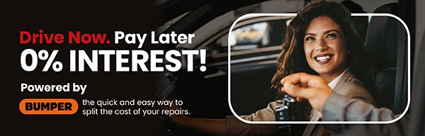Woman in a car receiving keys with Drive Now, Pay Later 0% Interest text overlay.