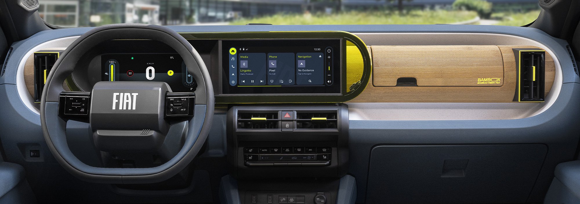 Fiat car interior dashboard with digital display and bamboo panel.