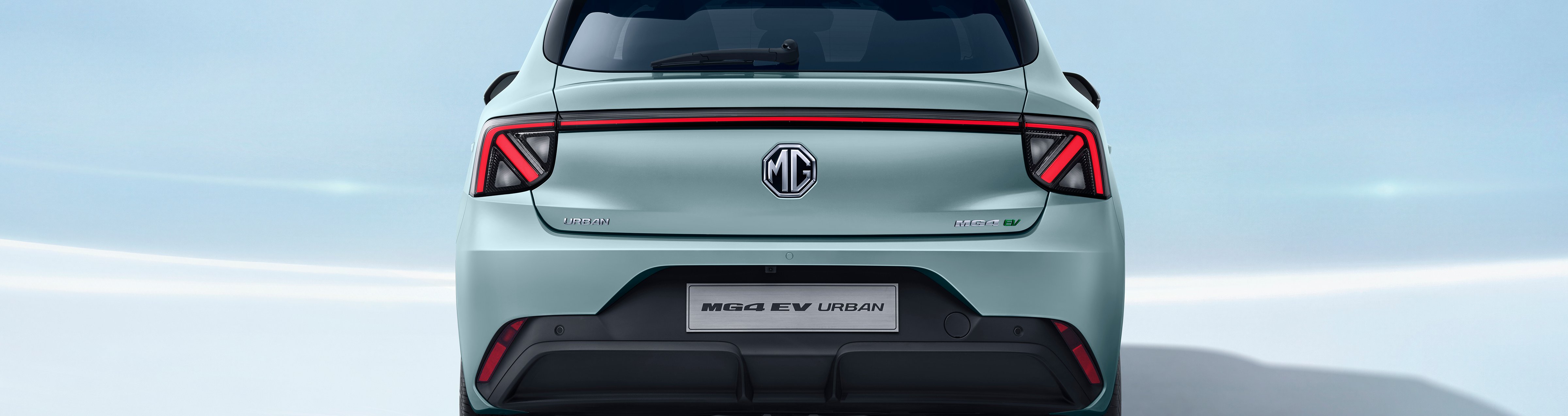 Rear view of a green MG4 EV Urban car.