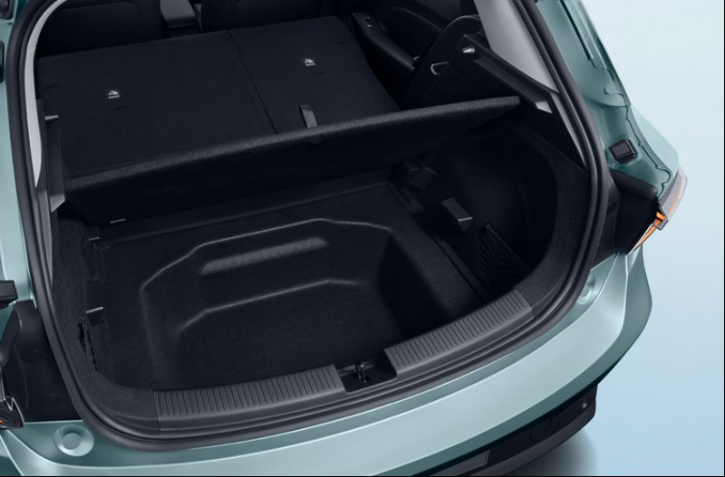 Boot of a car with seats folded down and a visible storage compartment.