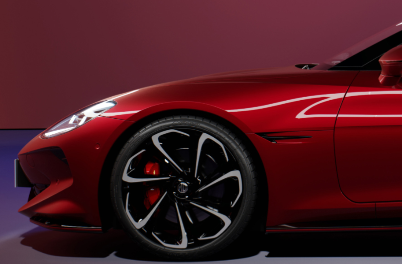 mg cyberster in red from front alloy wheels
