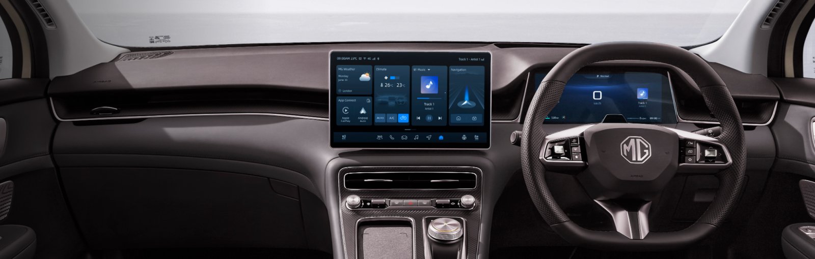 Car dashboard with touchscreen displays and steering wheel.
