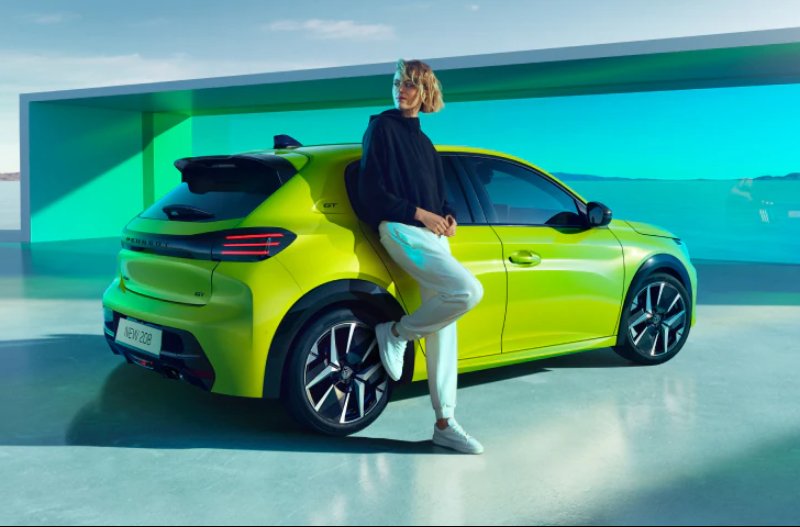 peugeot 208 with woman standing next to it