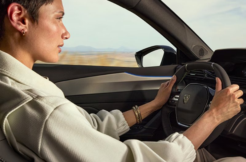 PEUGEOT 408 WOMAN DRIVING CAR
