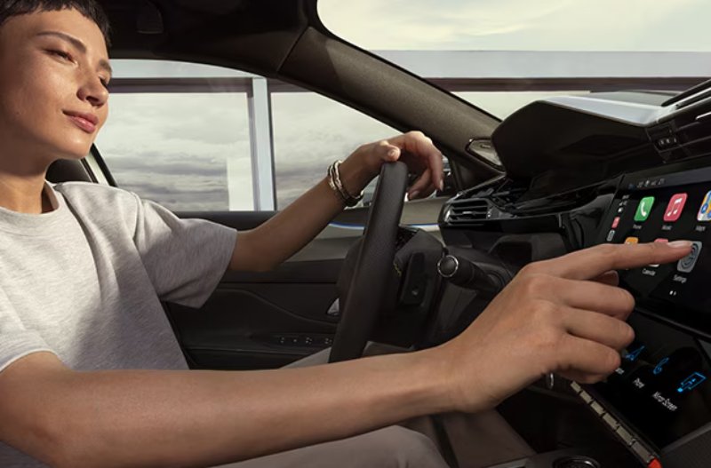 PEUGEOT 408 WOMAN IN CAR