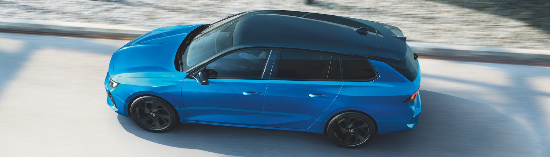 vauxhall astra sports tourer in blue from birds eye view