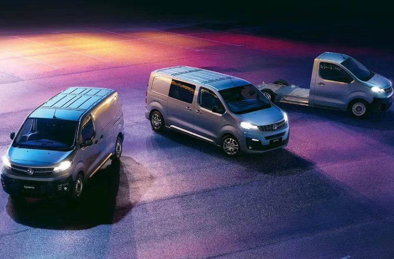 3 Vivaro vans in dark lighting